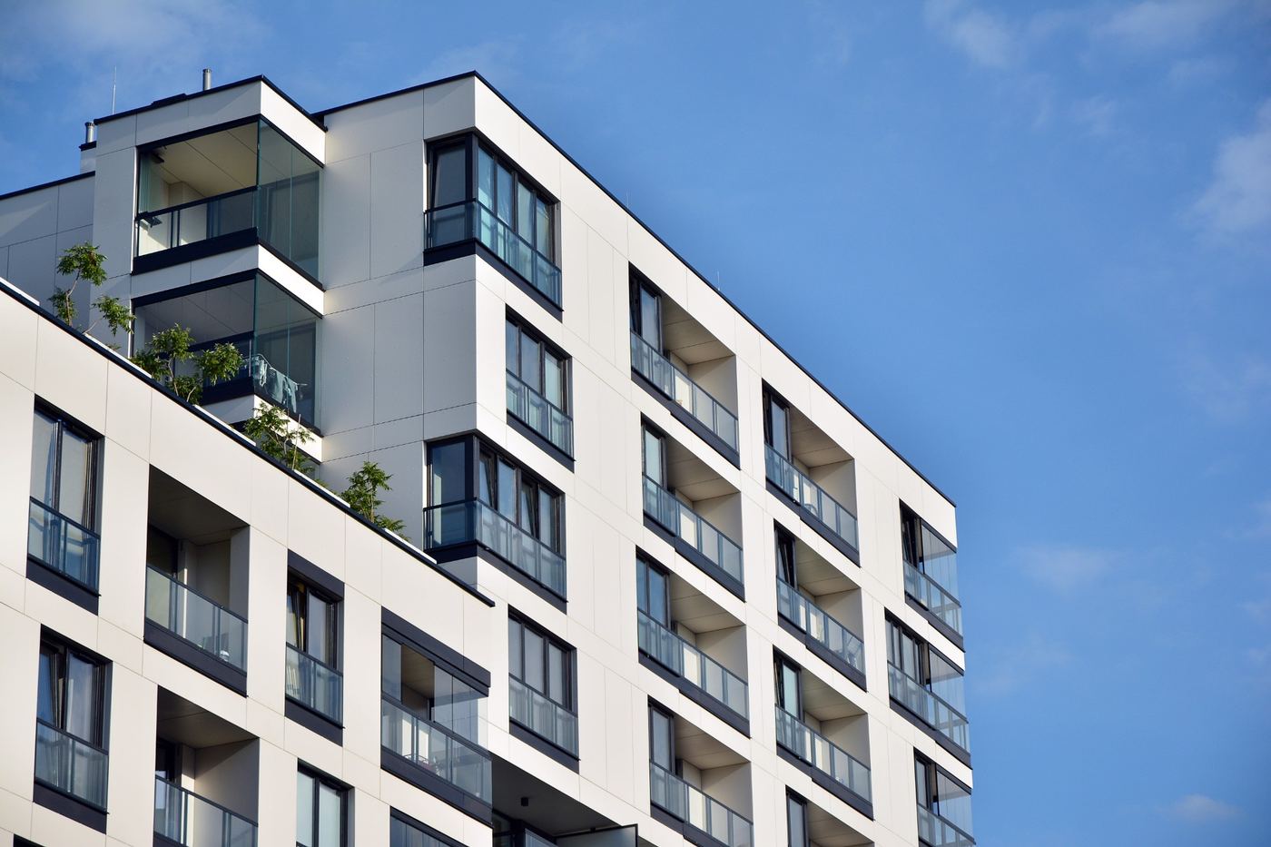 A modern condominium building with balconies